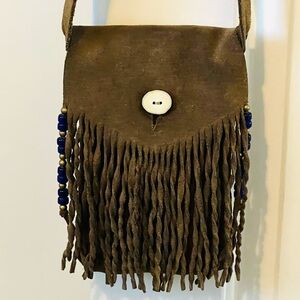 70’s suede hippie crossbody, handmade! 5 x 8 x 1. Note the hand-twisted braid.